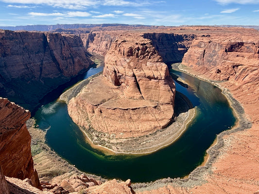 Breathtaking view of the Grand Canyon at sunrise, capturing the spirit of wanderlust and the wander gene