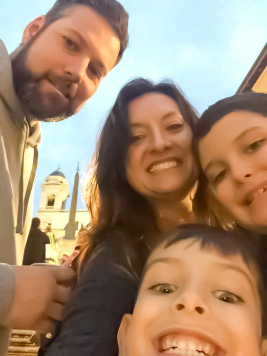 Parent and children exploring an international city together, passports in hand, embracing global travel and experiential learning